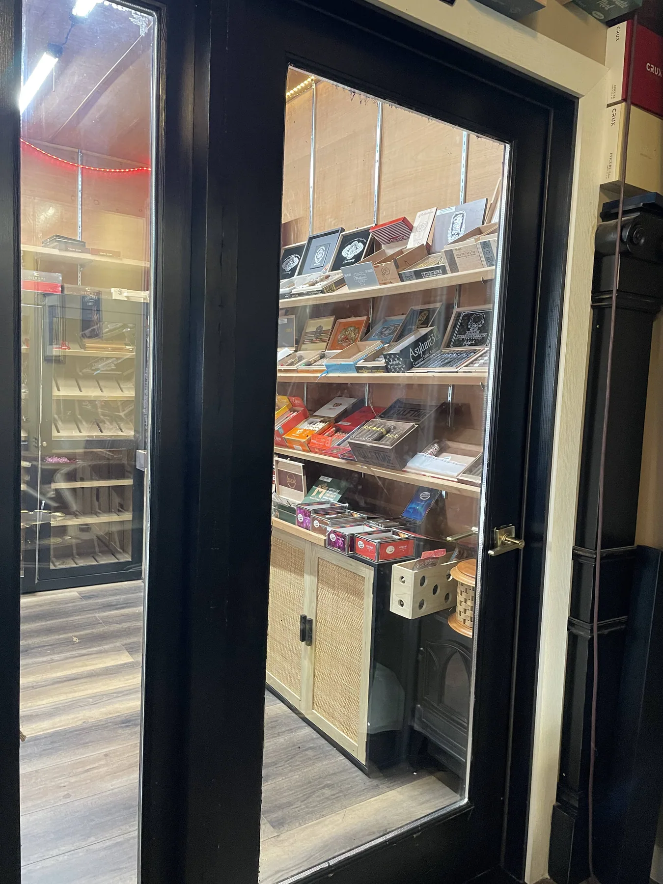 Walk-in humidor stocked with cigars at Exotic Blends